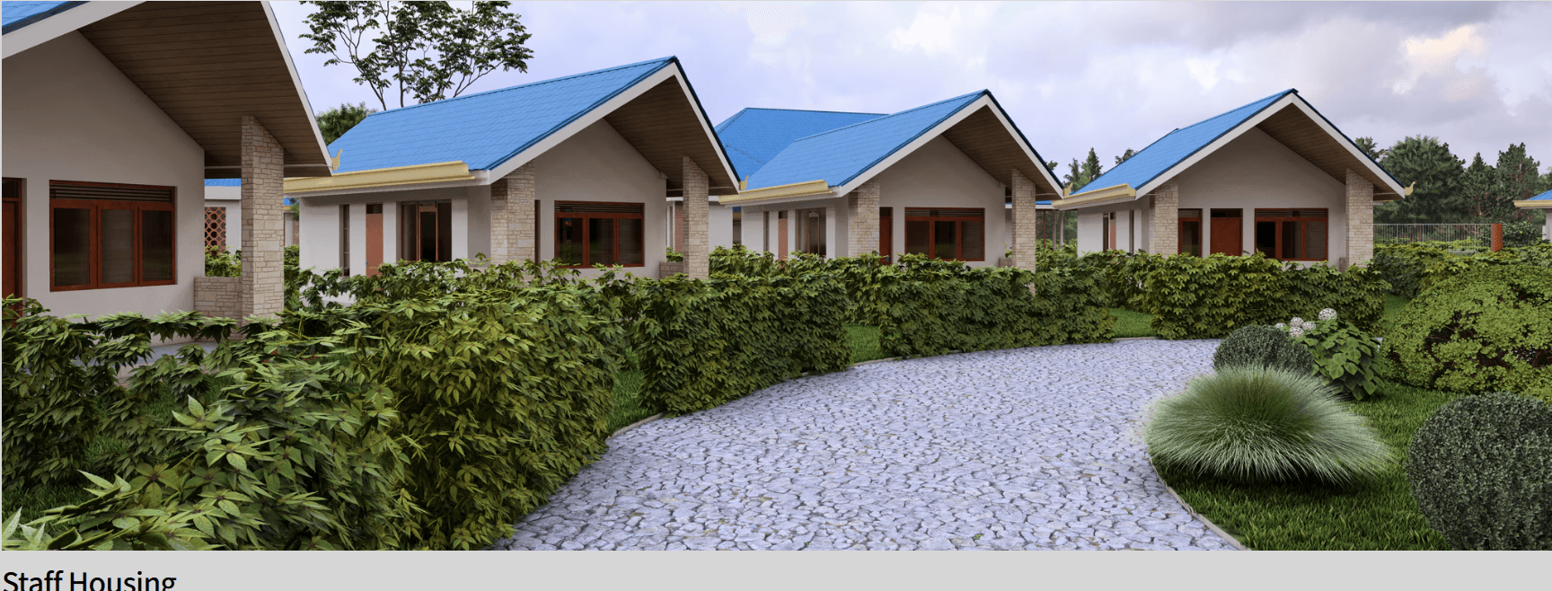 Staff housing cottages with blue roofs at Sirisia Leadership Academy