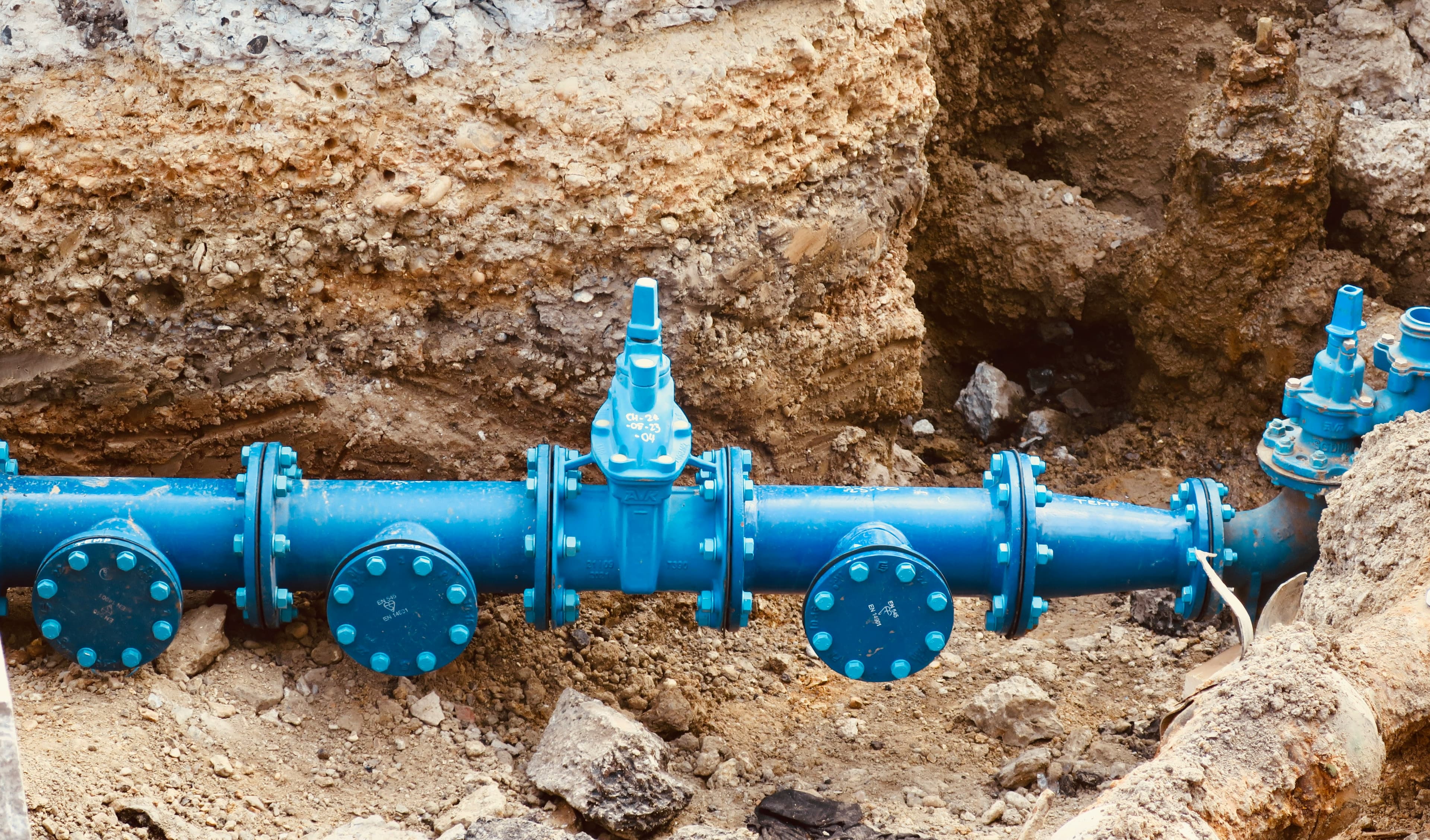 Main water main and valve installation in trench by MEP Solutions Ltd