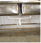 Stainless-steel twin sink waste and trap installation in the CITAM kitchen